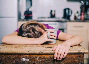 boost energy - tired woman with coffee